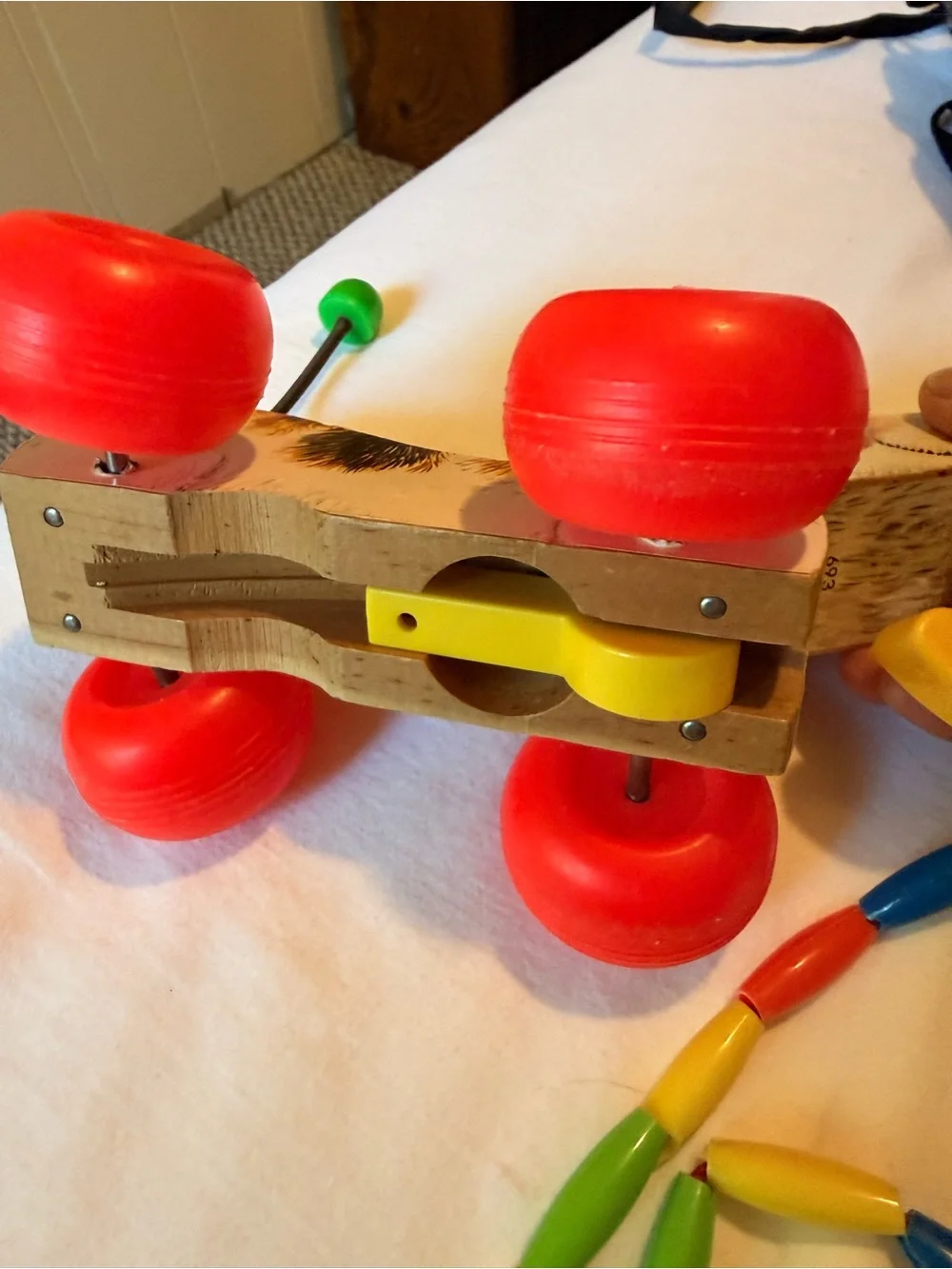 Vintage Wooden Pull-Along Dog Toy in Brown with Red Wheels 1968
